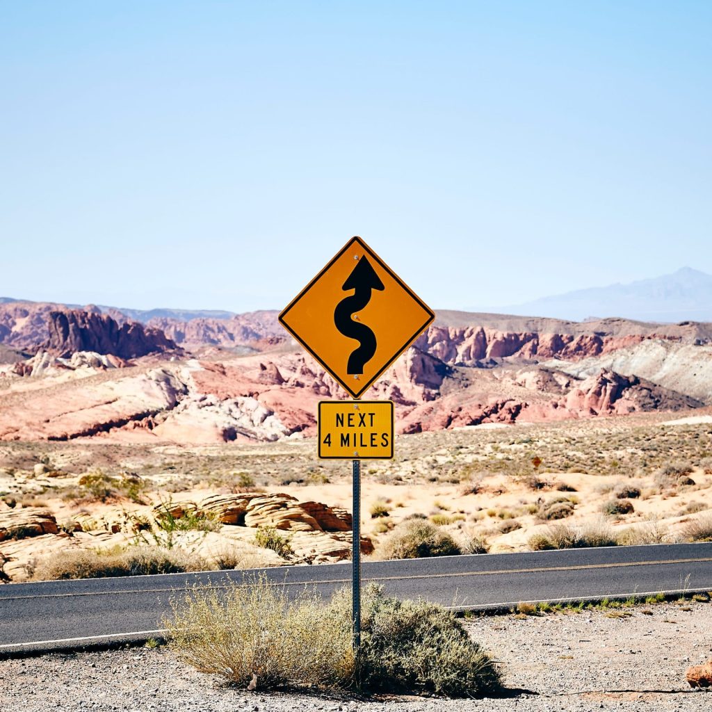 curved road sign