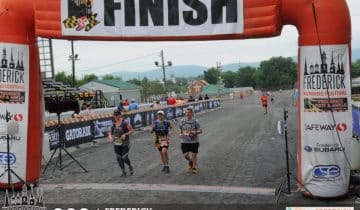 Eileen and Hubby crossing finish line