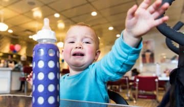 unhappy baby in restaurant