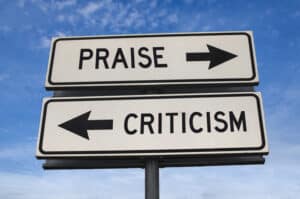 praise vs criticism